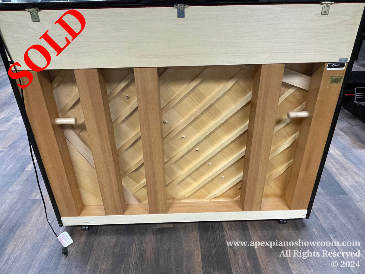 Upright piano back frame and soundboard construction with robust wooden beams and diagonal lattice structure, showcasing high-quality craftsmanship and structural integrity, suitable for a high-end musical instrument.